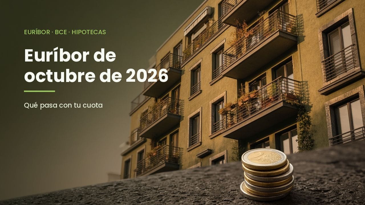Euríbor octubre 2026: fachada de un edificio de viviendas con monedas de euro apiladas en primer plano
